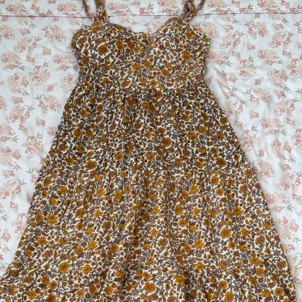 Knee length dress summer vibes 
Yellow flowers with chest support